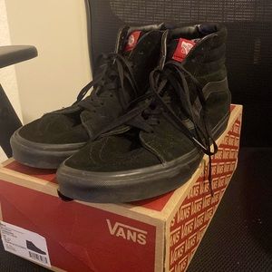 Black Hi Top Vans, size 12, still in good condition.